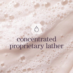 Person using Pureology Hydrate Sheer in shower for hydrated, weightless hair