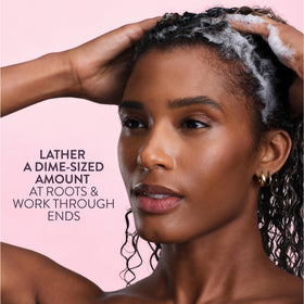 Pureology shampoo staged on bathroom shelf reflecting everyday styling routine benefit