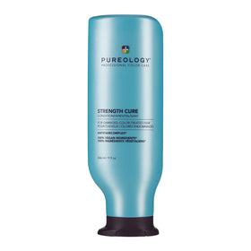 Pureology Strength Cure Conditioner front packaging showing product benefits