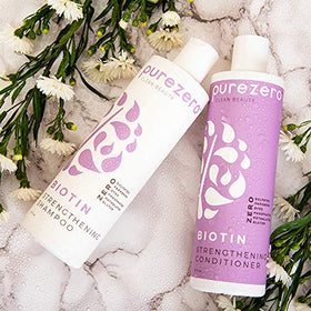 Purezero shampoo lather in shower illustrating gentle cleansing without sulfates
