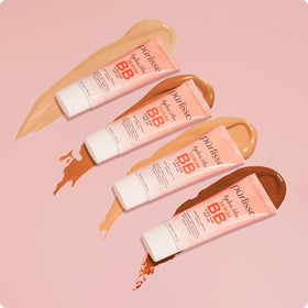 pūrlisse BB cream beside a coin showing 1.4 oz size for scale convenience