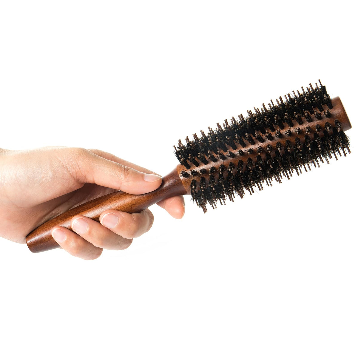 puto brush size comparison in hand, demonstrates scale and easy handling