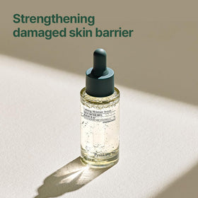 Pyunkang Yul bottle beside Centella leaves showing botanical soothing benefit
