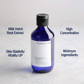 Pyunkang Yul bottle close-up showing clear essence texture for fast absorption
