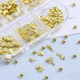 Qdsuh charms beside a coin to show compact size for precise nail use