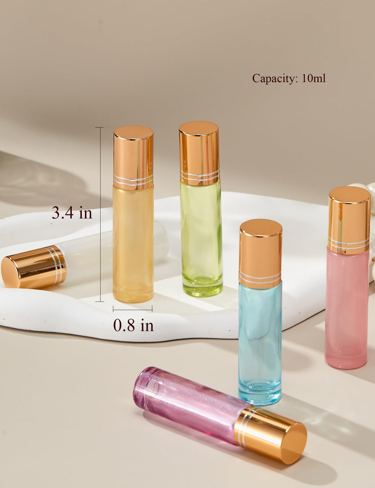 Qeuly bottle held in hand to show 10ml pocket-size scale and portability