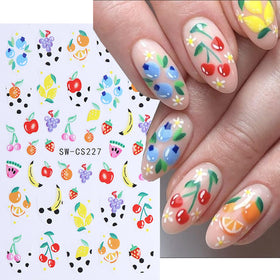 QEYRIYI stickers applied on nails close-up demonstrating neat adhesion and colorful summer look