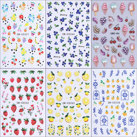 QEYRIYI summer manicure scene with fruit stickers styled outdoors, adding playful seasonal charm