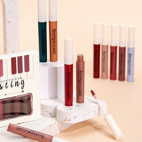 QiBest worn deep burgundy on lips for bold evening color payoff