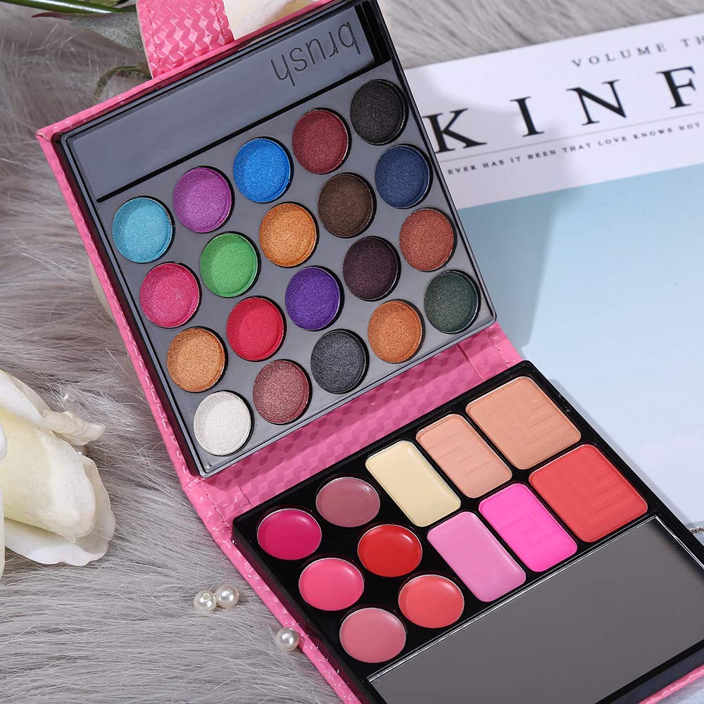 QiBest palette in hand to show compact scale and travel-friendly design