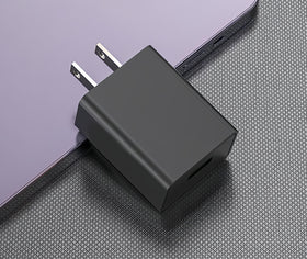 Qjin adapter on bathroom counter with grooming kit, organized travel convenience