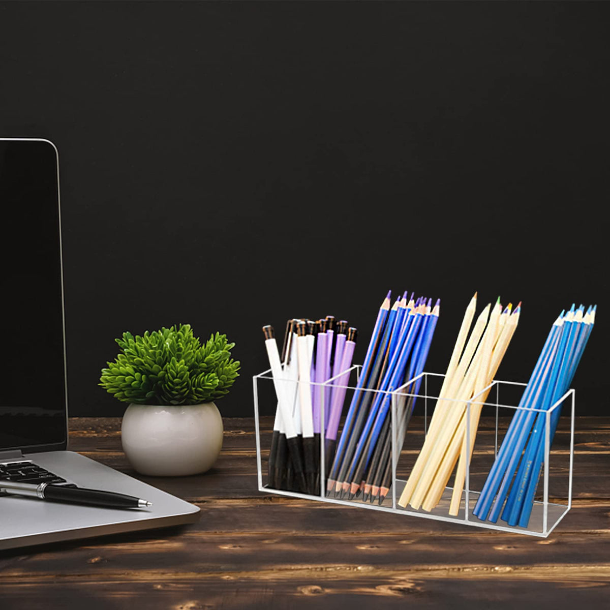 QPEY pen holder next to ruler showing compact size and scale