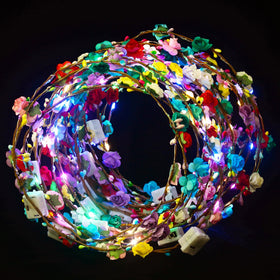 QSJQAMG front packaging showing 30 LED flower crowns and benefits for events