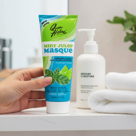 Queen Helene masque rinsing off with water showing gentle removal benefit