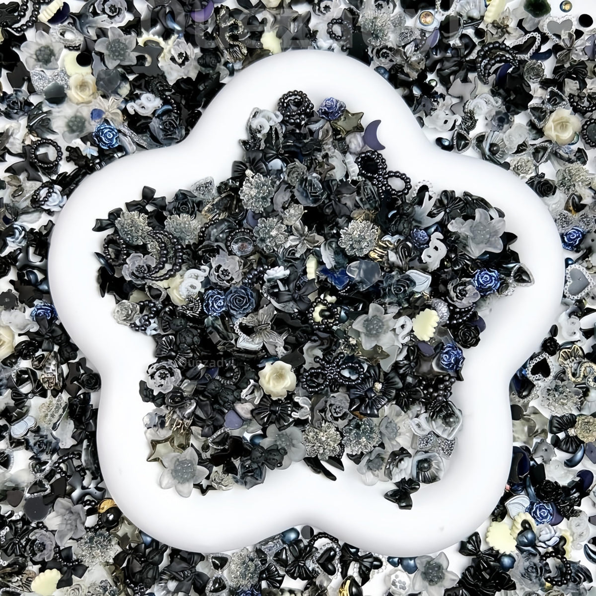 Quezadyl close-up of resin roses and dark bows highlighting fine detail and shine