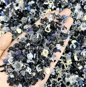 Quezadyl front packaging showing 300-piece mixed nail charms and variety benefits