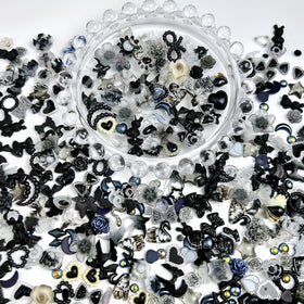 Quezadyl hollow pearls and heart charms showing texture and layering potential