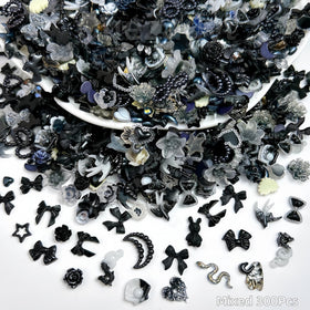 Quezadyl star and moon charm detail illustrating delicate shapes and contrast