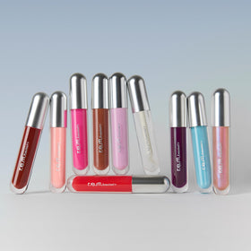 r.e.m. beauty lip swatch on model displaying sheer cotton candy tint and luminous shine