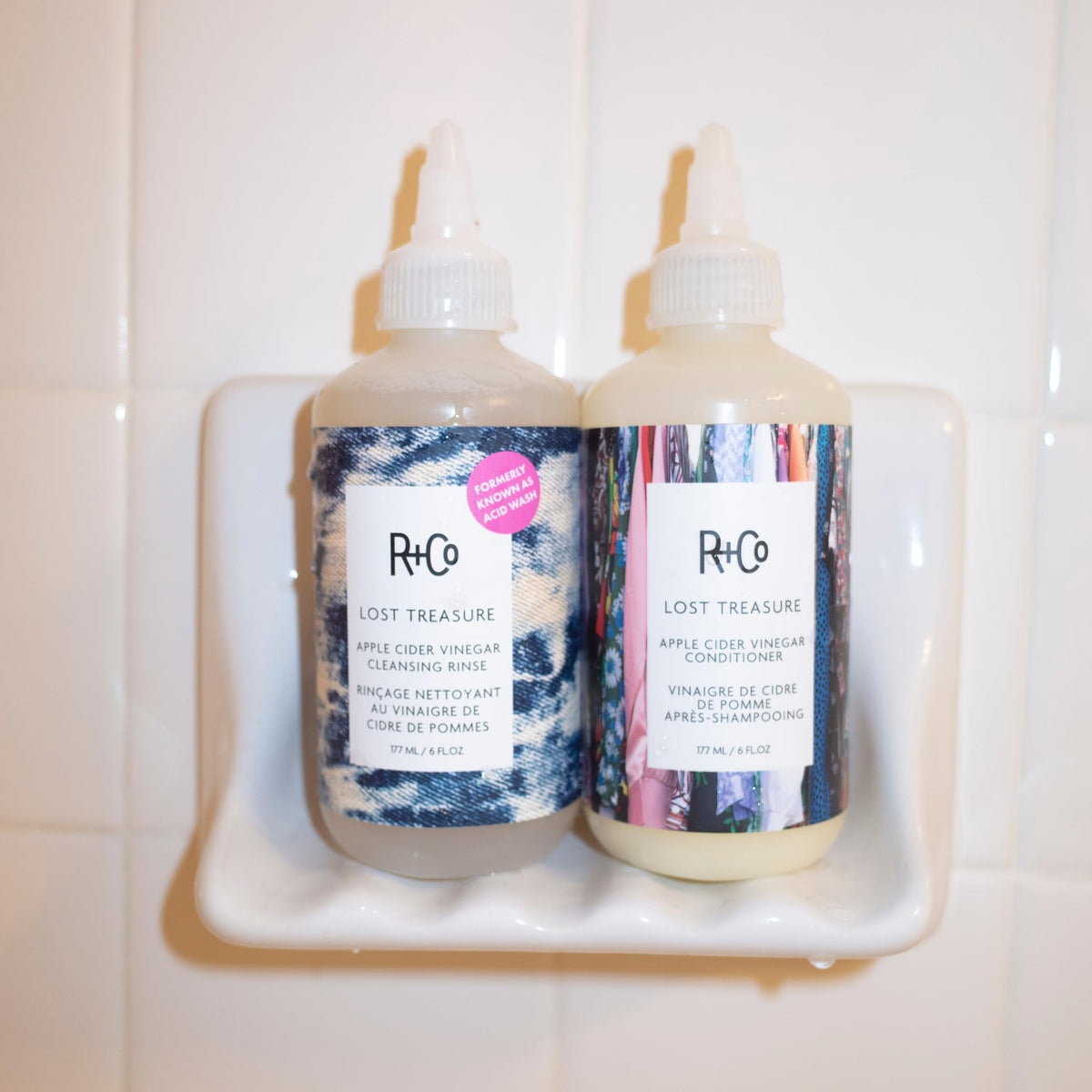 R+Co rinse being applied in shower showing scalp refresh and residue removal