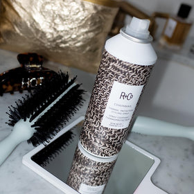 R+Co Chainmail texture on fingers highlighting non-greasy, silky finish