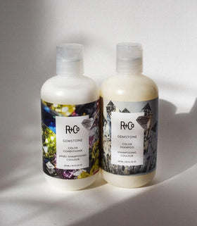 R+Co Gemstone in-shower use on wet hair showing gentle cleansing benefit