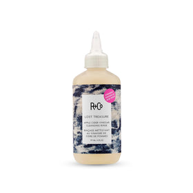 R+Co bottle front view showing label and product identity for clear purchase decision