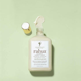 Rahua conditioner bottle in shower to illustrate easy in-shower use