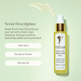 Rahua 1.6 fl oz bottle in hand illustrating compact travel-friendly size