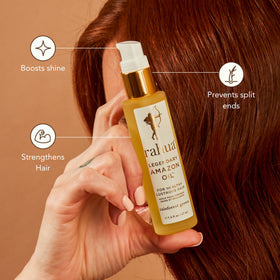 Rahua oil droplet on hair strand showing lightweight texture and smooth finish