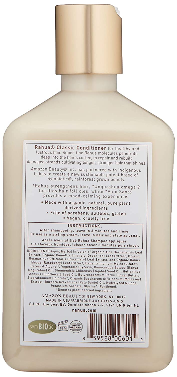Rahua conditioner held in hand to show size and portability benefits