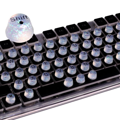 Raised Button front packaging displaying 64 clear glitter silicone keycaps and benefits