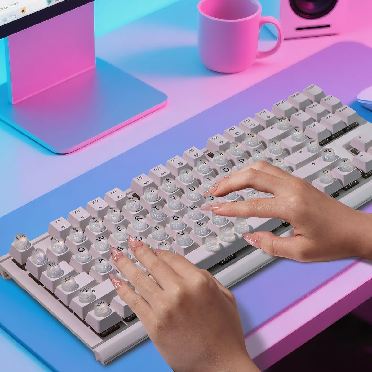 Raised Button next to hand for scale to show keycap height and fit on standard keys
