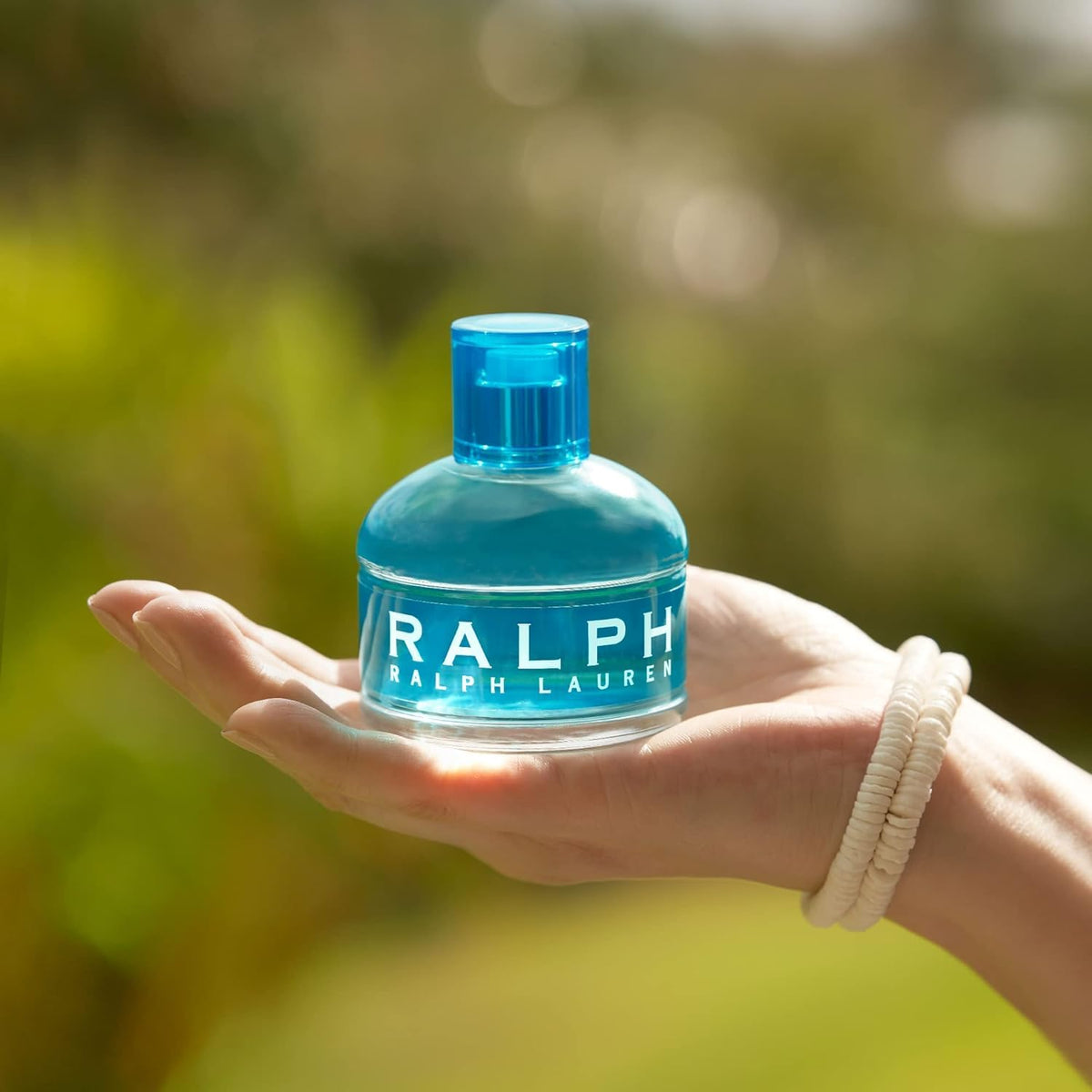 Ralph Lauren side profile of bottle emphasizing label and elegant shape