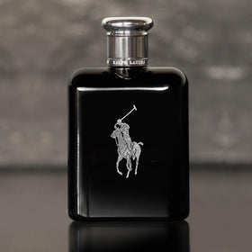 RALPH LAUREN bottle in hand illustrating 4.2 fl oz scale for travel convenience
