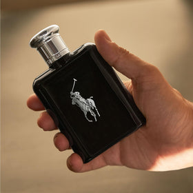 RALPH LAUREN spritzing bottle demonstrating easy application and fine mist