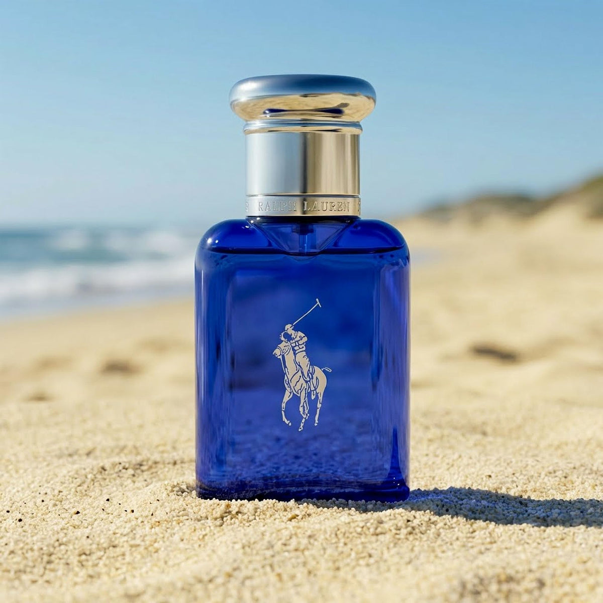 RALPH LAUREN FRAGRANCES bottle in hand showing compact travel-friendly size