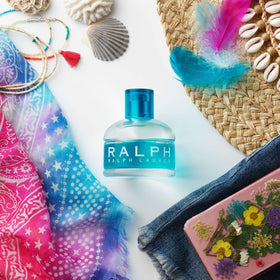 1 fl oz bottle held in hand for size comparison, Ralph Lauren conveying travel-friendly convenience
