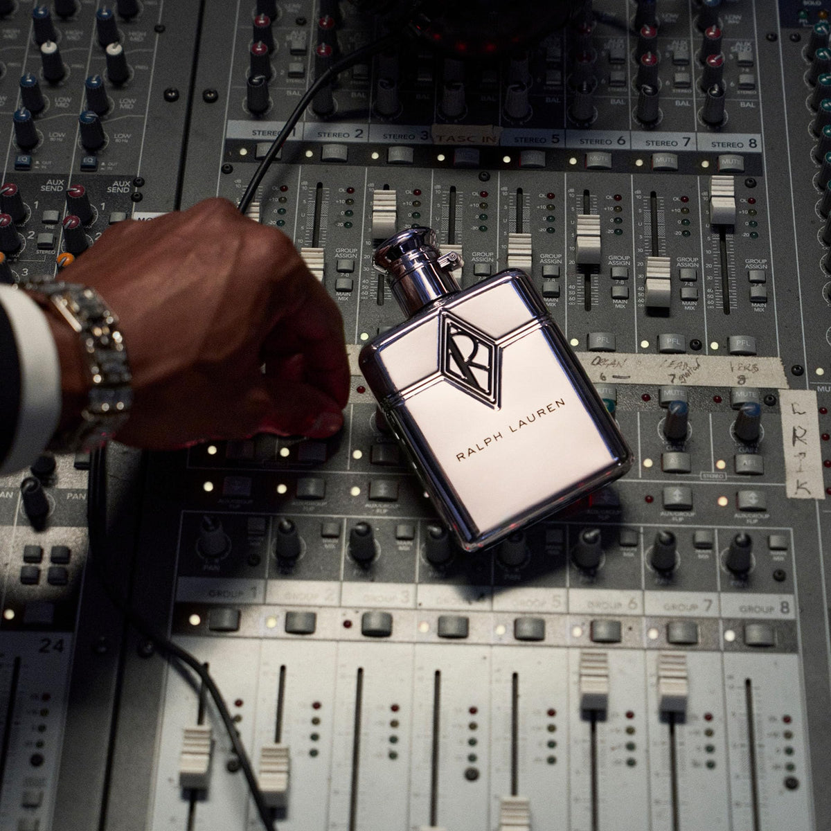 RALPH LAUREN FRAGRANCES bottle on a night-out table suggesting urban nightlife confidence benefit