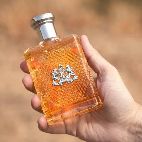 RALPH LAUREN FRAGRANCES Safari being sprayed on wrist to demonstrate application and freshness