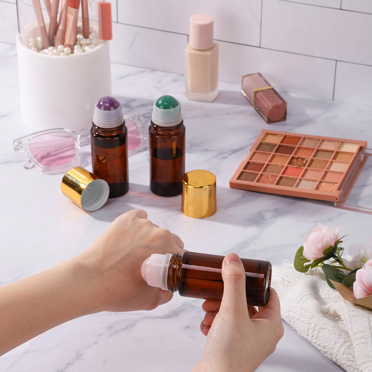 RAMFIYN in use applying perfume to wrist for precise, mess-free application