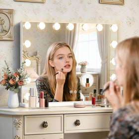 Ratsamee mirror on vanity in use with cosmetics, providing true‑to‑tone lighting for application
