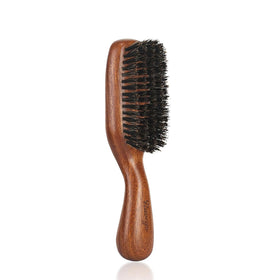 RAVEGO angled front view of brush showing compact shape and durability