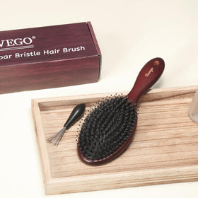 RAVEGO in a bathroom setting showing everyday styling use for shinier hair benefit
