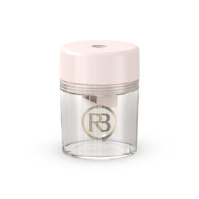 Ravie Beauty pink sharpener front view showing compact design and travel convenience