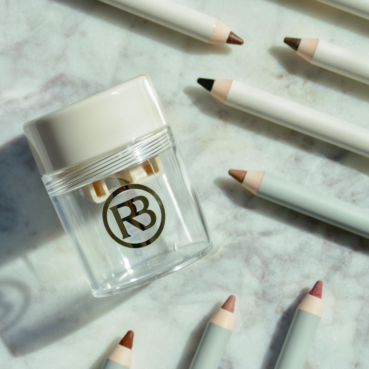 Ravie Beauty placed in makeup bag, ideal for on-the-go touch-ups