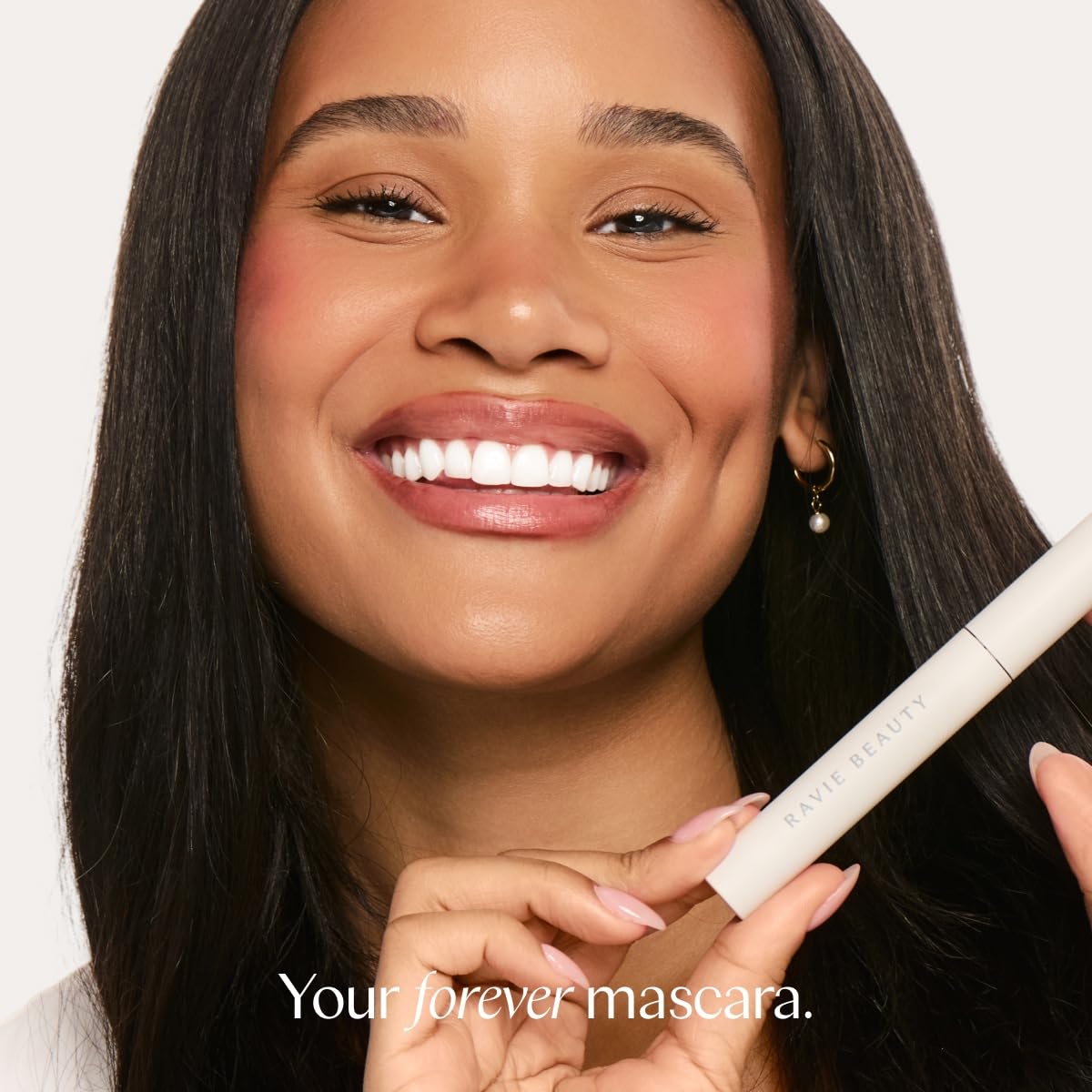 Ravie Beauty on a bathroom vanity suggesting easy removal with warm water benefit