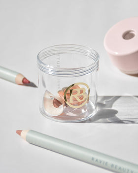 Ravie Beauty sharpener held in hand to show portable scale and ease of use