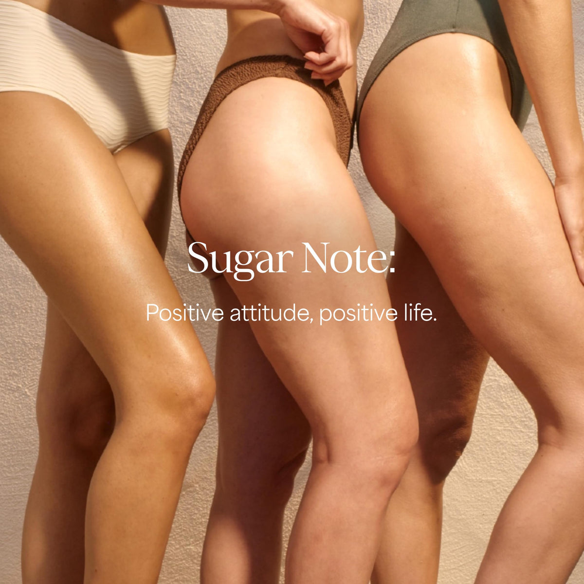 RAW SUGAR oil droplets on palm highlighting moisturizing jojoba and coconut