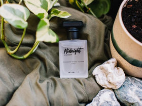 RawChemistry Midnight flatlay with lavender, orange blossom, patchouli ingredients visual